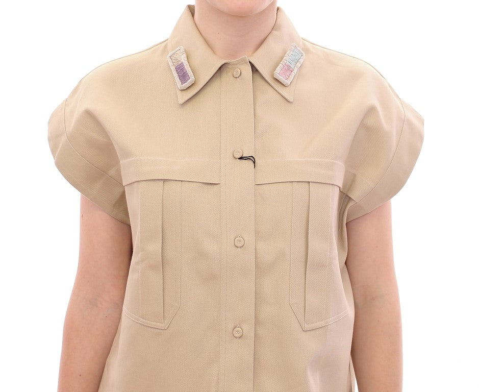 Mouwloos beige katoenen tanktopje met broches