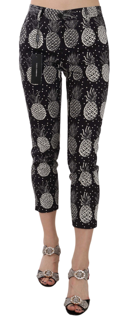 Chique zwarte skinny capribroek met ananasprint