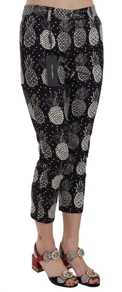 Chique zwarte skinny capribroek met ananasprint