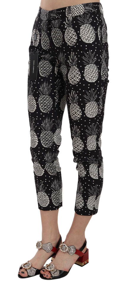 Chique zwarte skinny capribroek met ananasprint