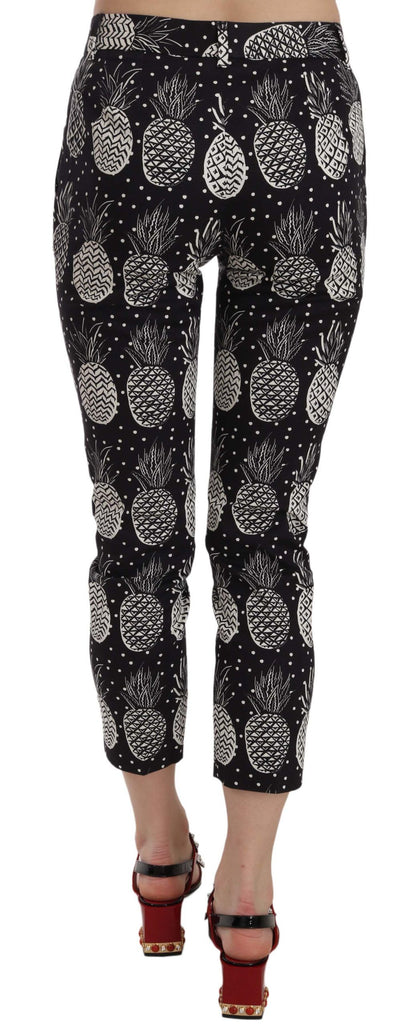 Chique zwarte skinny capribroek met ananasprint