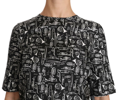 Prachtige zijden blouse met trompetprint