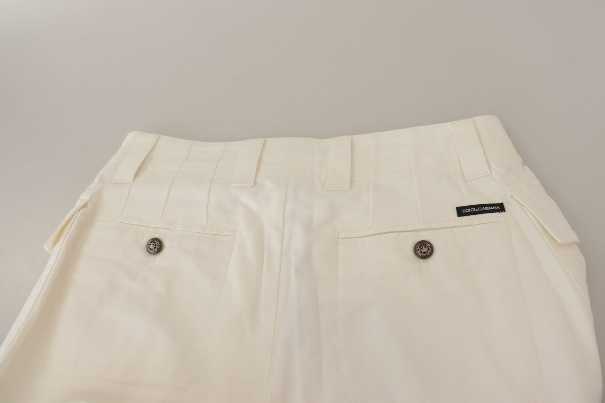 Elegante witte taps toelopende broek met hoge taille