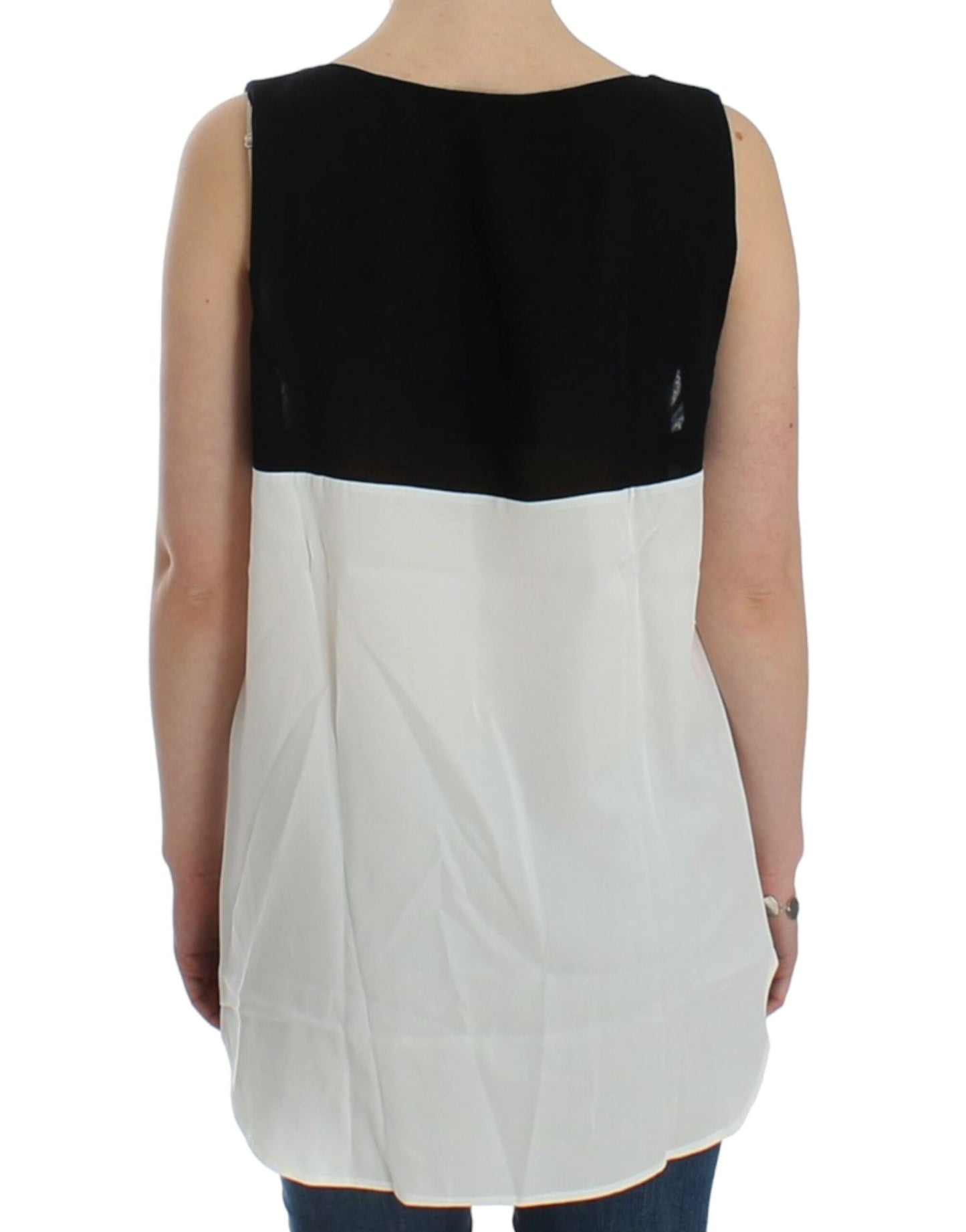 Elegante monochrome mouwloze top met gouden accenten