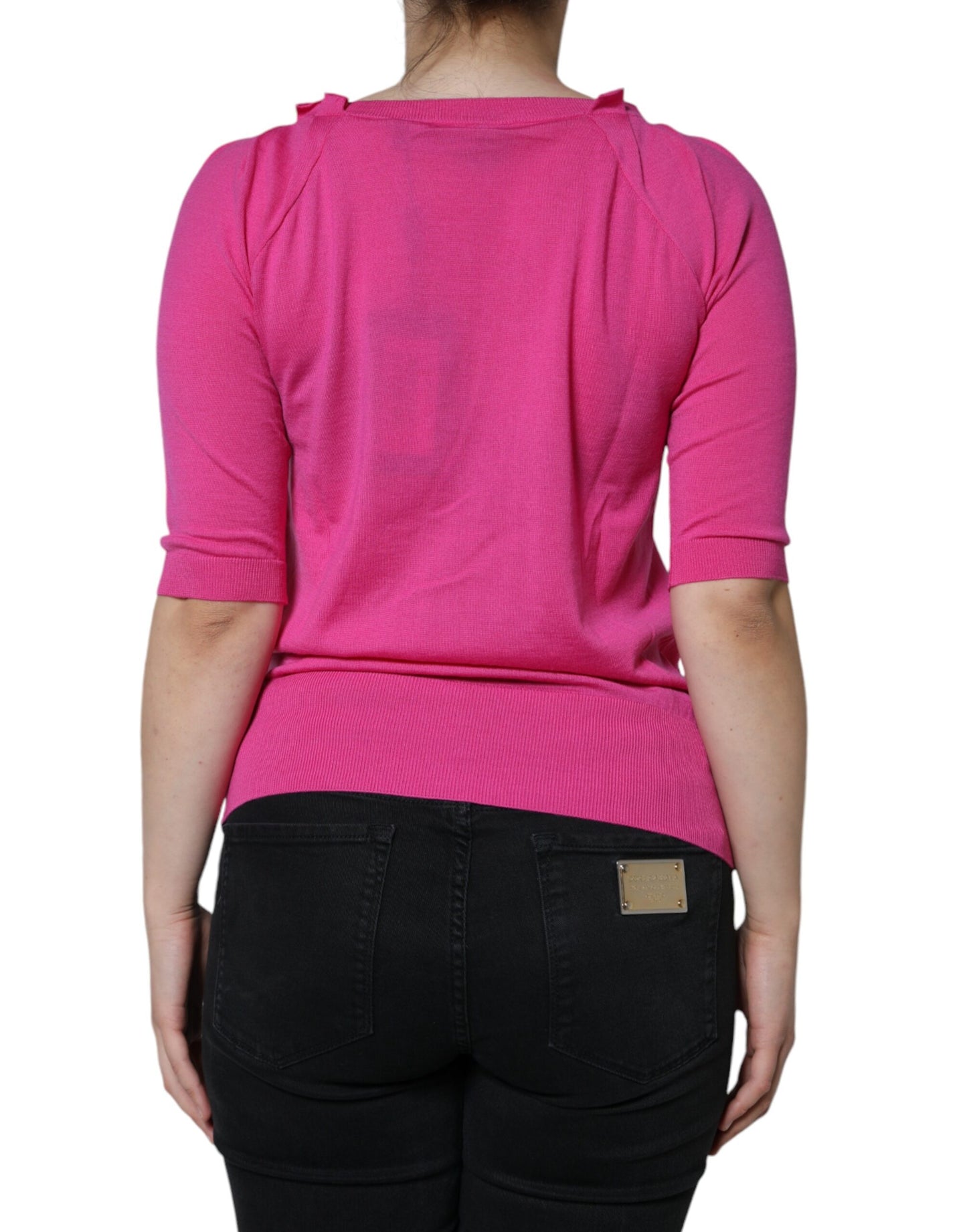 Roze wollen blouse met korte mouwen en knoopjes