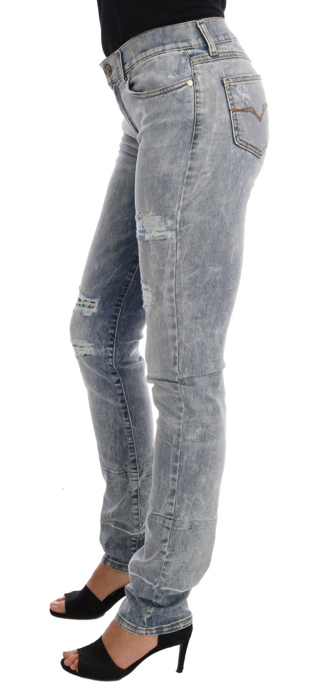 Chique lichtblauwe gescheurde slim fit jeans