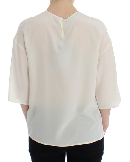 Ivoorkleurige blouse met pailletten van zijde