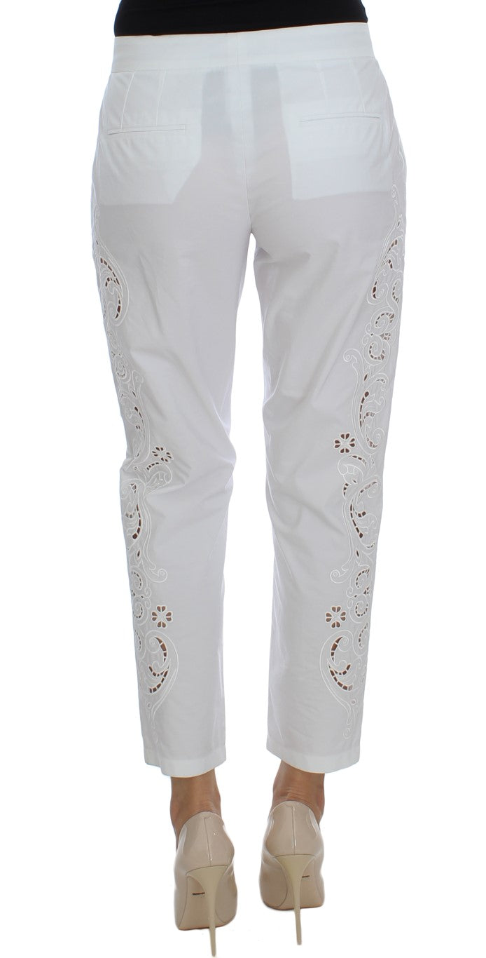 Elegante witte bloemenuitsparing broek