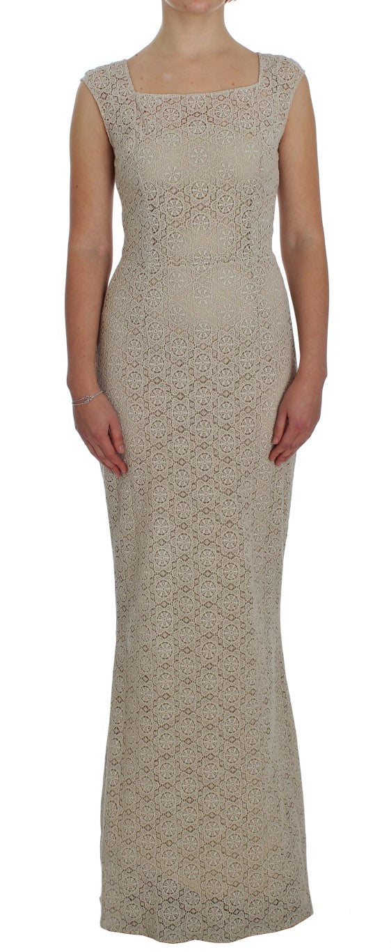 Elegante beige maxi-jurk met bloemenuitsparing