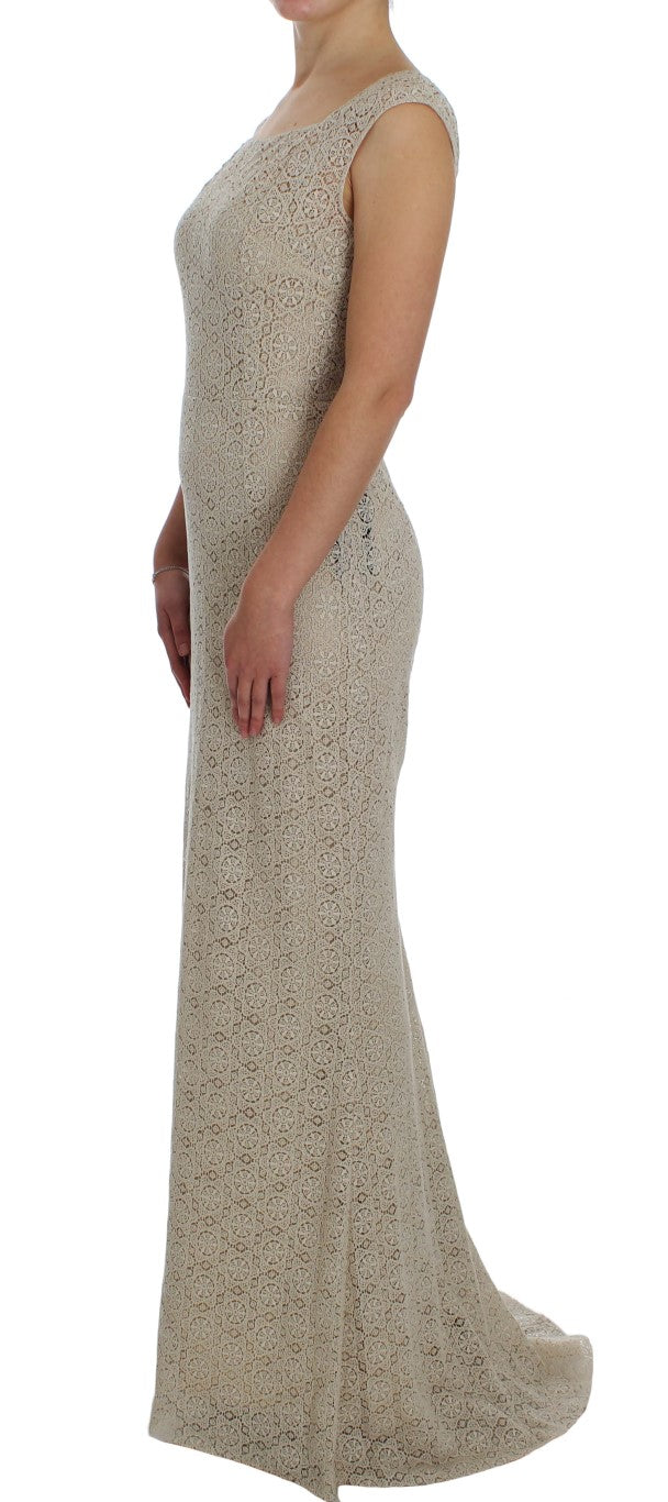 Elegante beige maxi-jurk met bloemenuitsparing