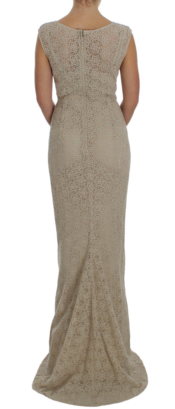 Elegante beige maxi-jurk met bloemenuitsparing